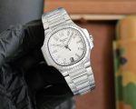 Patek Philippe Nautilus Ladies White Gold Diamond Bezel 7118 - Image 2